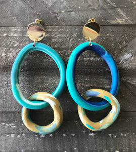 Tropical Double Hoops